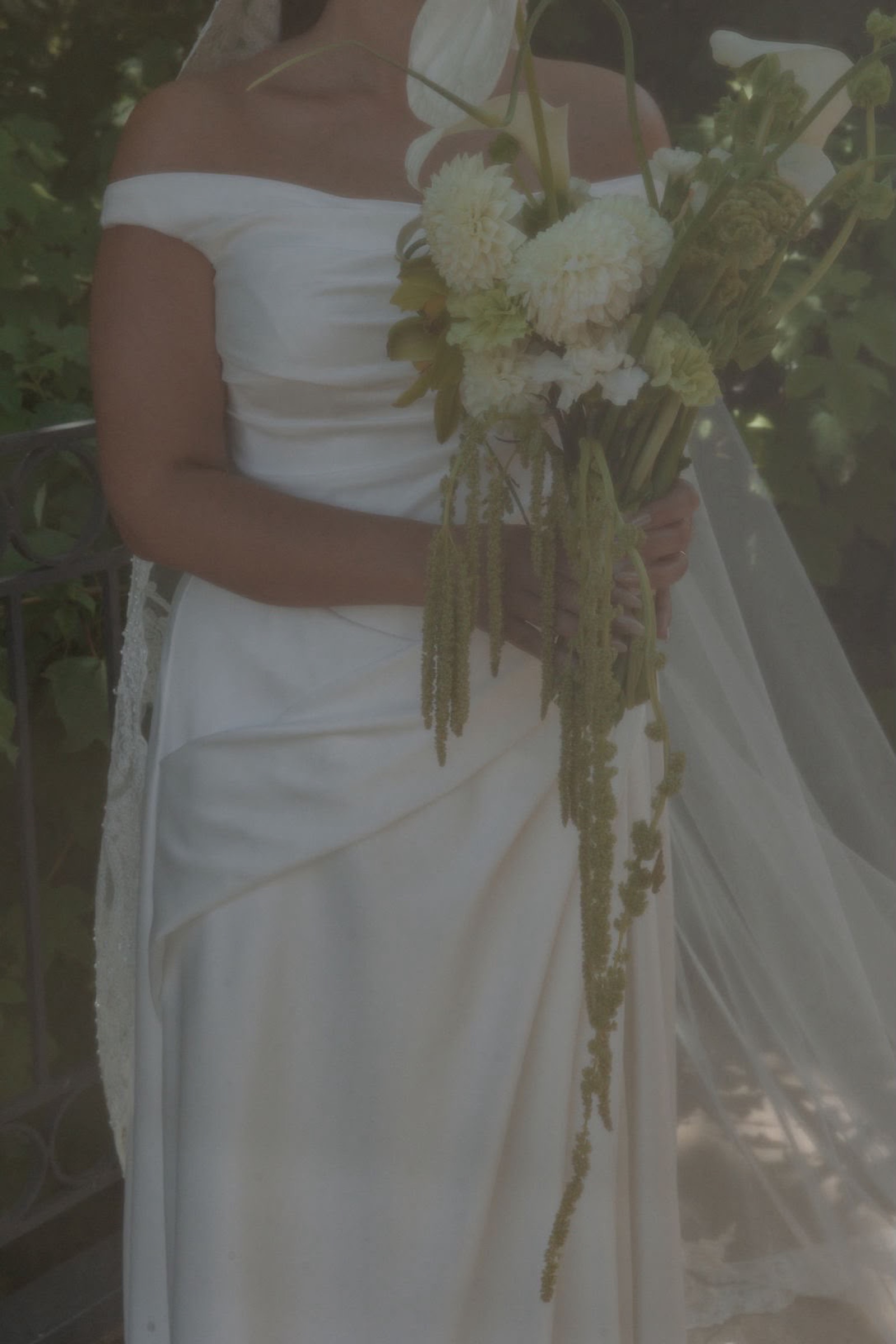 Bridal gown with trailing amaranthus