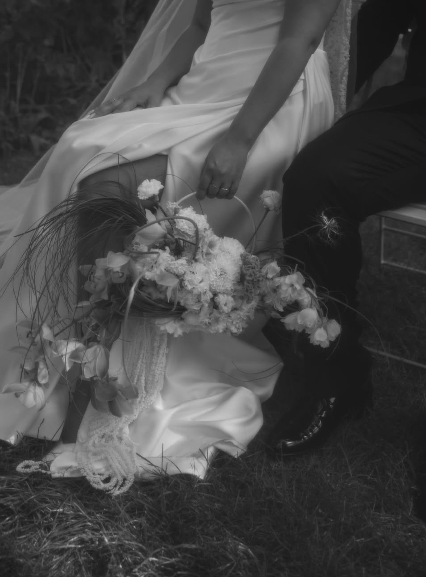 Bride seated with her bouquet