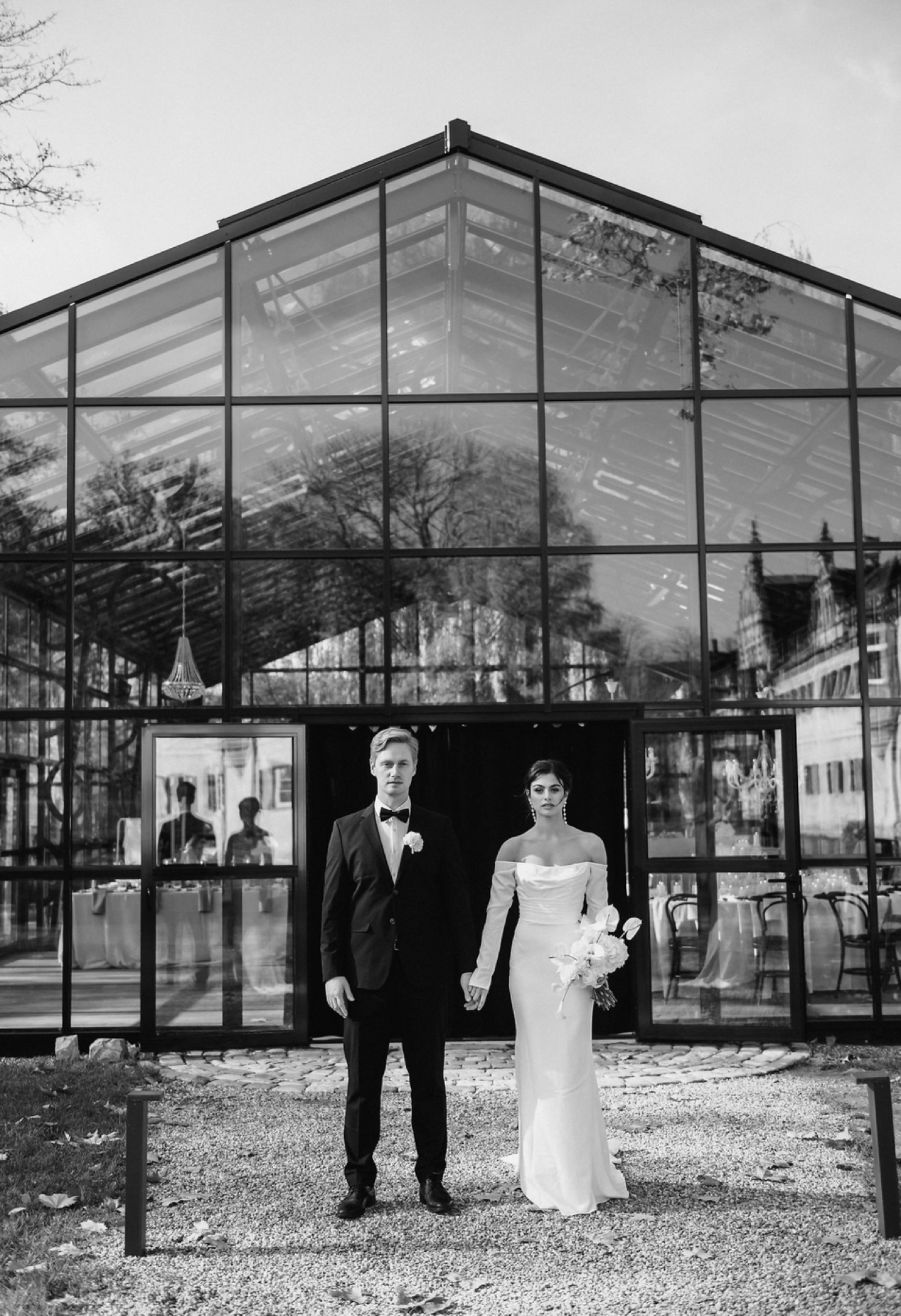 Couple before the glass pavilion