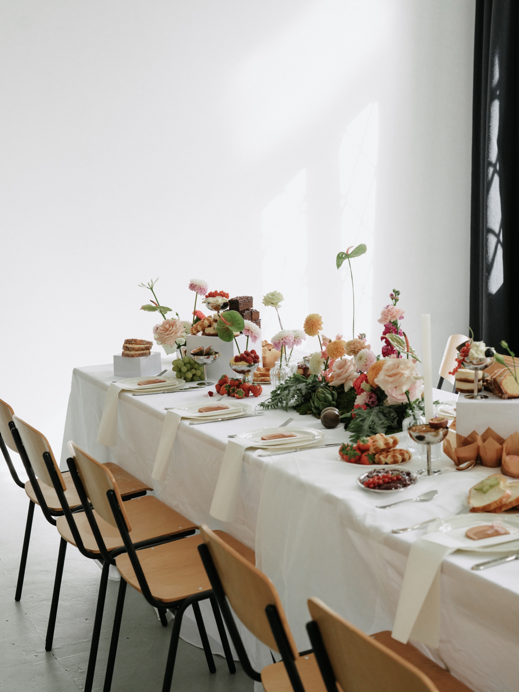 Loft table dressed with flowers and bread